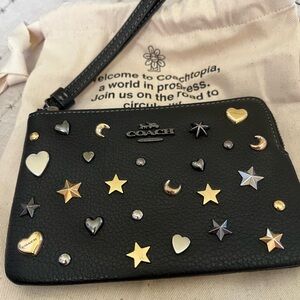 Coach Black Wristlet with Gold and Silver Stars, Hearts, And Moons